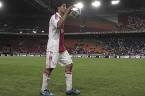 Ajax player Luis Suarez reacts after the match against Slovan Bratislava during the qualifying soccer match of the Europa League at Amsterdam ArenA stadium, Netherlands, Thursday, Aug. 20, 2009. Suarez scored four goals, Ajax won the match with a 5-0 score. (AP Photo/Cynthia Boll)