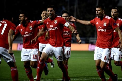 Benfica's players celebrate their sides first goal against PAOK during the Champions League playoffs, second leg, soccer match between PAOK and Benfica at theToumba stadium in the northern Greek port city of Thessaloniki, on Wednesday, Aug. 29, 2018. (AP Photo/Giannis Papanikos)