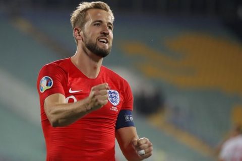 England's Harry Kane celebrates after scoring his side's sixth goal during the Euro 2020 group A qualifying soccer match between Bulgaria and England, at the Vasil Levski national stadium, in Sofia, Bulgaria, Monday, Oct. 14, 2019. (AP Photo/Vadim Ghirda)