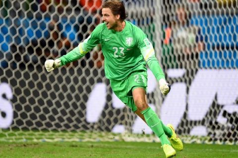 SALVADOR, BRAZIL - JULY 05:  Goalkeeper Tim Krul of the Netherlands celebrates after making a save on a penalty kick by Michael Umana  of Costa Rica (not pictured) to defeat Costa Rica in a shootout in the 2014 FIFA World Cup Brazil Quarter Final match between the Netherlands and Costa Rica at Arena Fonte Nova on July 5, 2014 in Salvador, Brazil.  (Photo by Jamie McDonald/Getty Images)