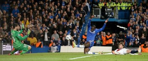 Chelsea's Demba Ba scores his side's second goal during the UEFA Champions League Quarter Final match at Stamford Bridge, London. PRESS ASSOCIATION Photo. Picture date: Tuesday April 8, 2014. See PA story SOCCER Chelsea. Photo credit should read: Andrew Matthews/PA Wire