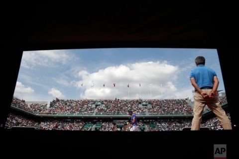 In this Wednesday, May 31, 2017 photo, Spain's Rafael Nadal prepares to serve against Netherlands' Robin Haase during their second round match of the French Open tennis tournament at the Roland Garros stadium, in Paris, France. (AP Photo/Petr David Josek)