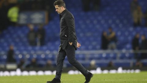 Everton coach Marco Silva leaves at the end of the English Premier League soccer match between Everton and Tottenham at Goodison Park Stadium, in Liverpool, England, Sunday, Dec. 23, 2018. (AP Photo/Jon Super)