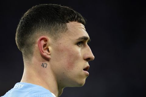 Manchester City's Phil Foden watches the game during the Champions League quarterfinal second leg soccer match between Manchester City and Real Madrid at the Etihad Stadium in Manchester, England, Wednesday, April 17, 2024. (AP Photo/Dave Thompson)