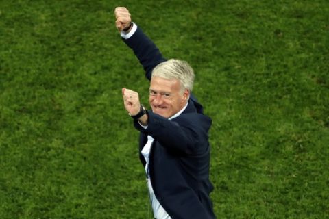France head coach Didier Deschamps celebrates at the end of the semifinal match between France and Belgium at the 2018 soccer World Cup in the St. Petersburg Stadium in St. Petersburg, Russia, Tuesday, July 10, 2018. (AP Photo/Pavel Golovkin)