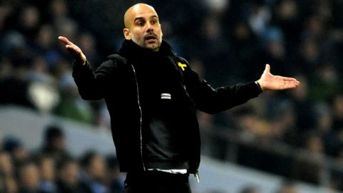 Manchester City manager Josep Guardiola during the English Premier League soccer match between Manchester City and Tottenham Hotspur at Etihad stadium, in Manchester, England, Saturday, Dec. 16, 2017. (AP Photo/Rui Vieira)