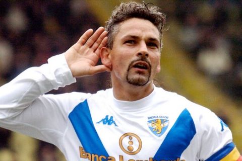 Brescia soccer star Roberto Baggio reacts after scoring during the Italian first division soccer match between Parma and Brescia at the Tardini stadium in Parma, Italy, Sunday, March 14, 2004. Baggio scored his 200th goal. (AP Photo/Marco Vasini)