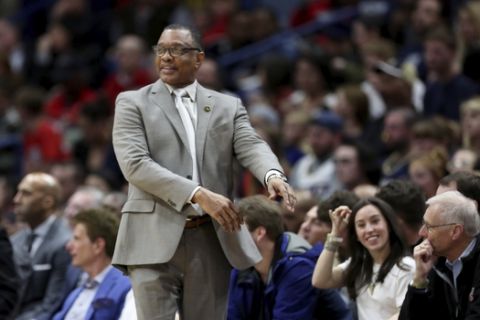 New Orleans Pelicans coach Alvin Gentry reacts to a call by an official during the second half of the team's NBA basketball game against the Cleveland Cavaliers in New Orleans, Friday, Feb. 28, 2020. (AP Photo/Rusty Costanza)