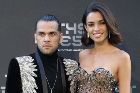 Brazilian soccer player Dani Alves and his wife Joana Sanz arrive for the ceremony of the Best FIFA Football Awards in the Royal Festival Hall in London, Britain, Monday, Sept. 24, 2018. (AP Photo/Frank Augstein)