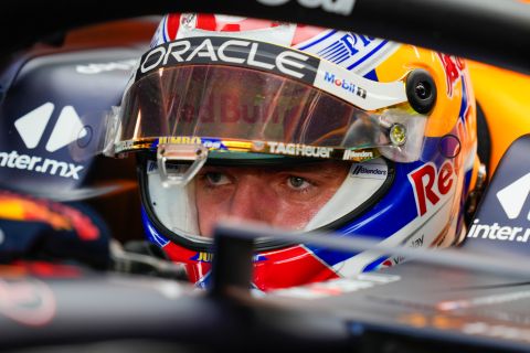 Red Bull driver Max Verstappen of the Netherlands sits in his car in pit lane during the first practice session of the Singapore Formula One Grand Prix at the Marina Bay Street Circuit, Singapore,Friday, Sept. 15, 2023. (AP Photo/Vincent Thian)