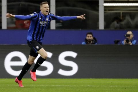 Atalanta's Josip Ilicic celebrates after scoring his side's second goal during the Champions League round of 16, first leg, soccer match between Atalanta and Valencia at the San Siro stadium in Milan, Italy, Wednesday, Feb. 19, 2020. (AP Photo/Luca Bruno)