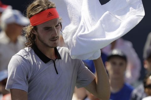 Stefanos Tsitsipas, of Greece, during his match against Daniil Medvedev, of Russia, during the second round of the U.S. Open tennis tournament, Wednesday, Aug. 29, 2018, in New York. (AP Photo/Kevin Hagen)