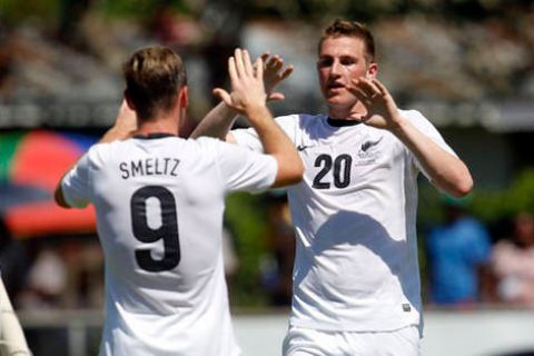 NZ's Chris Wood celebrates his goal with Shane Smeltz. OFC Nations Cup 2012, Papua New Guinea v New Zealand, Lawson Tama Honiara, Monday 4th June 2012. Photo: Shane Wenzlick