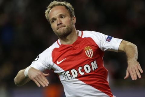 Monaco's Valere Germain reacts after scoring his team's third goal during the Champions League quarterfinal second leg soccer match between Monaco and Dortmund at the Louis II stadium in Monaco, Wednesday April 19, 2017. (AP Photo/Claude Paris)