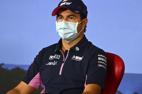 Racing Point driver Sergio Perez of Mexico speaks during a news conference at the Red Bull Ring racetrack in Spielberg, Austria, Thursday, July 9, 2020. Styrian Formula One Grand Prix will be held on Sunday. (Clive Mason/Pool via AP)