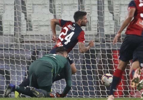 Genoa's Daniel Bessa scores the equalizer during an Italian Serie A soccer match between Juventus and Genoa, at the Alliance stadium in Turin, Italy, Saturday, Oct. 20, 2018. (AP Photo/Antonio Calanni)