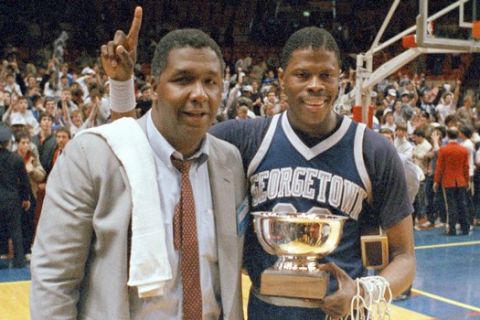 Patrick Ewing, basketball player for Georgetown University, with coach John Thompson on March 9, 1985. Location unknown. (AP Photo)