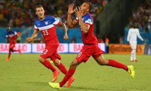 NATAL, BRAZIL - JUNE 16: John Brooks of the United States (R) celebrates scoring his team's second goal with Fabian Johnson during the 2014 FIFA World Cup Brazil Group G match between Ghana and the United States at Estadio das Dunas on June 16, 2014 in Natal, Brazil.  (Photo by Kevin C. Cox/Getty Images)