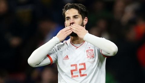 Spain's Isco Alarcon celebrates scoring his side's third goal during the international friendly soccer match between Spain and Argentina at the Wanda Metropolitano stadium in Madrid, Spain, Tuesday, March 27, 2018. (AP Photo/Francisco Seco)