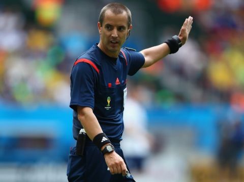 BRASILIA, BRAZIL - JUNE 30: Referee Mark Geiger gestures during the 2014 FIFA World Cup Brazil Round of 16 match between France and Nigeria at Estadio Nacional on June 30, 2014 in Brasilia, Brazil.  (Photo by Ian Walton/Getty Images)