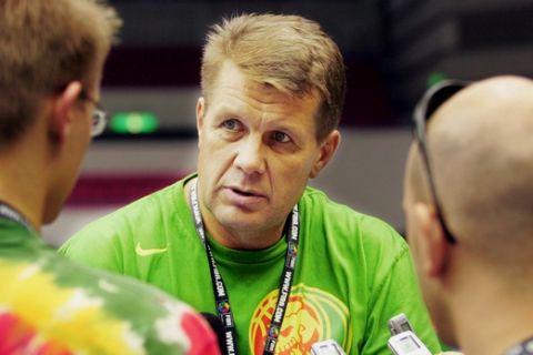 Lithuania Head coach Antanas Sireika talks with reporters Friday, Aug. 18, 2006 during a practice session in Hamamatsu, central Japan.  Lithuania begins play at the World Championships in Group C on Saturday against Turkey.  (AP Photo/Koji Sasahara)