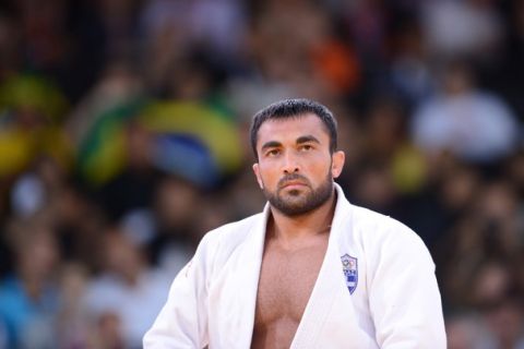 Greece's Ilias Iliadis reacts after winning his men's -90kg judo contest repechage match of the London 2012 Olympic Games on August 1, 2012 at the ExCel arena in London. AFP PHOTO / FRANCK FIFE        (Photo credit should read FRANCK FIFE/AFP/GettyImages)