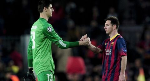 Atletico Madrid's Belgian goalkeeper Thibaut Courtois (L) shakes hands with Barcelona's Argentinian forward Lionel Messi during the UEFA Champions League quarterfinal first leg football match FC Barcelona vs Club Atletico de Madrid at the Camp Nou stadium in Barcelona on April 1, 2014. The game ended in a draw 1-1.    AFP PHOTO/ JOSEP LAGO        (Photo credit should read JOSEP LAGO/AFP/Getty Images)
