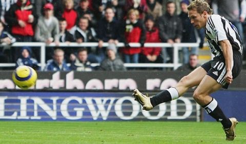 NEWCASTLE, ENGLAND - NOVEMBER 28: Craig Bellamy of Newcastle scores the opening goal during the FA Barclays Premiership match between Newcastle United and Everton at St James Park on November 28, 2004 in Newcastle, England.  (Photo by Laurence Griffiths/Getty Images) *** Local Caption *** Craig Bellamy