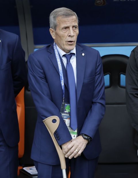 Uruguay head coach Oscar Tabarez stands prior to the start of he group A match between Egypt and Uruguay at the 2018 soccer World Cup in the Yekaterinburg Arena in Yekaterinburg, Russia, Friday, June 15, 2018. (AP Photo/Natacha Pisarenko)