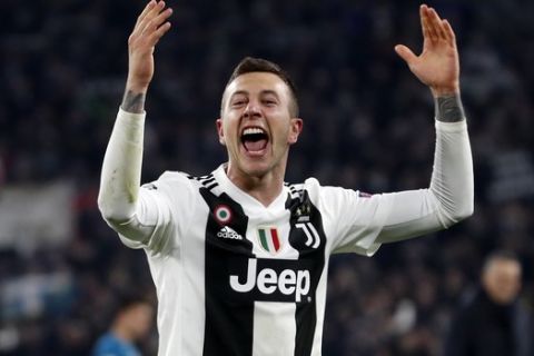 Juventus' Federico Bernardeschi celebrates at the end of the Champions League round of 16, 2nd leg, soccer match between Juventus and Atletico Madrid at the Allianz stadium in Turin, Italy, Tuesday, March 12, 2019. (AP Photo/Antonio Calanni)