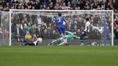 Chelsea's Marcos Alonso scores his team's second goal against Tottenham Hotspur during their English Premier League soccer match in London, England, Saturday, Feb. 22, 2020. (AP Photo/Kirsty Wigglesworth)