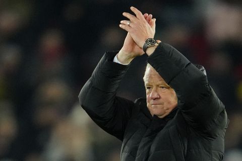 Sheffield United's new head coach Chris Wilder waves after the English Premier League soccer match between Sheffield United and Liverpool at Bramall Lane in Sheffield, England, Wednesday, Dec. 6, 2023. (AP Photo/Jon Super)