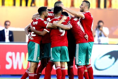 Morocco players celebrate after they scored during the African Cup of Nations group D soccer match between Morocco and Namibia in Al Salam Stadium in Cairo, Egypt, Sunday, June 23, 2019. (AP Photo/Ariel Schalit)