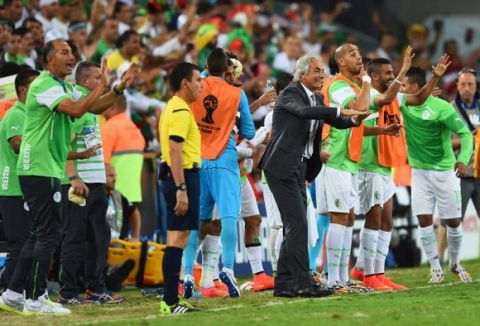 CURITIBA, BRAZIL - JUNE 26: Head coach Vahid Halilhodzic of Algeria and his bench react late in the match during the 2014 FIFA World Cup Brazil Group H match between Algeria and Russia at Arena da Baixada on June 26, 2014 in Curitiba, Brazil.  (Photo by Matthias Hangst/Getty Images)