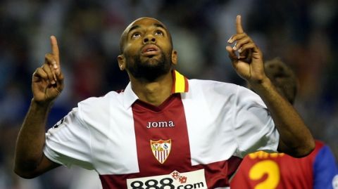 Frederic Kanoute celebrates his goal during the  Champions League Group H soccer match against Steaua in Seville, Spain, Tuesday Oct. 23, 2007. (AP Photo/Miguel Morenatti) 