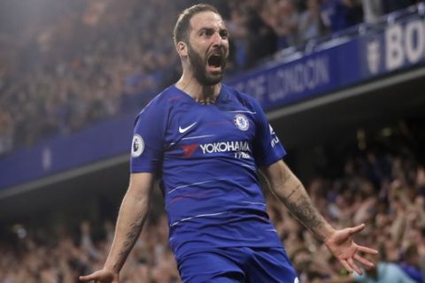 Chelsea's Gonzalo Higuain celebrates scoring his side's second goal during the English Premier League soccer match between Chelsea and Burnley at Stamford Bridge stadium in London, Monday, April 22, 2019. (AP Photo/Kirsty Wigglesworth)