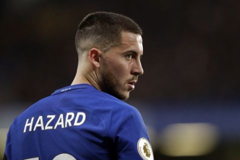 Chelsea's Eden Hazard looks on during the English Premier League soccer match between Chelsea and Crystal Palace at Stamford Bridge stadium in London, Saturday, March 10, 2018. (AP Photo/Matt Dunham)