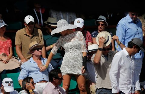 Spectators gather in the stands on a court for a match at the French Open tennis tournament at the Roland Garros stadium, in Paris, France. Monday, June 5, 2017. (AP Photo/Michel Euler)