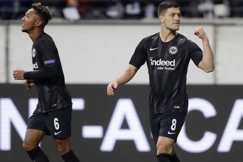 Frankfurt's Luka Jovic, right, celebrates his side's third goal during a Europa League group H soccer match between Eintracht Frankfurt and Lazio Rom in Frankfurt, Germany, Thursday, Oct. 4, 2018. (AP Photo/Michael Probst)
