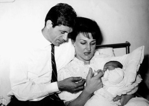 Cesare Maldini and his wife Marisa cradle their newly born son Paolo