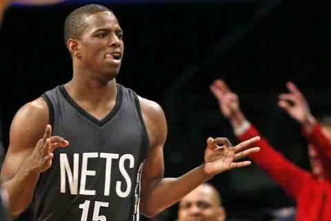 Brooklyn Nets guard Isaiah Whitehead (15) gestures after hitting a three-point shot in the first half of an NBA basketball game against the New York Knicks, Sunday, March 12, 2017, in New York. (AP Photo/Kathy Willens)