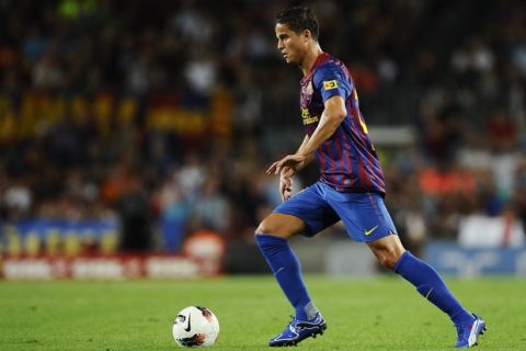 BARCELONA, SPAIN - SEPTEMBER 17:  Ibrahim Afellay of FC Barcelona runs with the ball during the La Liga soccer match between FC Barcelona and CA Osasuna at Camp Nou Stadium on September 17, 2011 in Barcelona, Spain. FC Barcelona won 8-0.  (Photo by David Ramos/Getty Images)