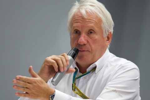 Charlie Whiting, International Automobile Federation, or FIA, Race Director, gestures answering a question during a news conference at the 'Sochi Autodrom' Formula One circuit , in Sochi, Russia, Friday, Oct. 10, 2014. (AP Photo/Pavel Golovkin)