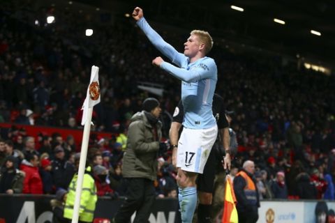 Manchester City's Kevin De Bruyne celebrates at the end of the English Premier League soccer match between Manchester United and Manchester City at Old Trafford Stadium in Manchester, England, Sunday, Dec. 10, 2017. City won 2-1. (AP Photo/Dave Thompson)