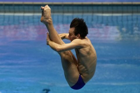 Athanasios Tsirikos of Greece competes in the 1m Springboard Men at the World Swimming Championships in Fukuoka, Japan, Friday, July 14, 2023. (AP Photo/Lee Jin-man)