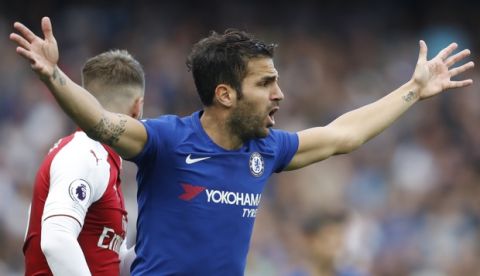 Chelsea's Cesc Fabregas gestures during the English Premier League soccer match between Chelsea and Arsenal at Stamford Bridge stadium in London, Sunday, Sept. 17, 2017. (AP Photo/Frank Augstein)