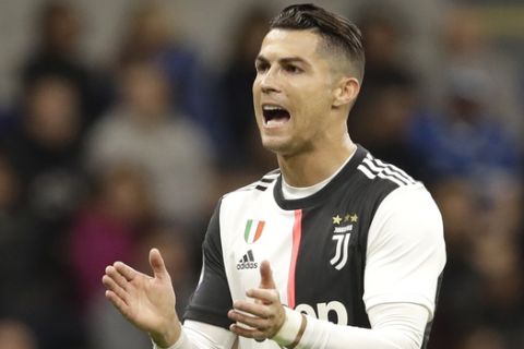 Juventus' Cristiano Ronaldo reacts during a Serie A soccer match between Inter Milan and Juventus, at the San Siro stadium in Milan, Italy, Sunday, Oct. 6, 2019. (AP Photo/Luca Bruno)