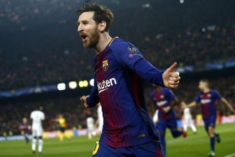 Barcelona's Lionel Messi celebrates after scoring the opening goal during the Champions League round of sixteen second leg soccer match between FC Barcelona and Chelsea at the Camp Nou stadium in Barcelona, Spain, Wednesday, March 14, 2018. (AP Photo/Manu Fernandez)