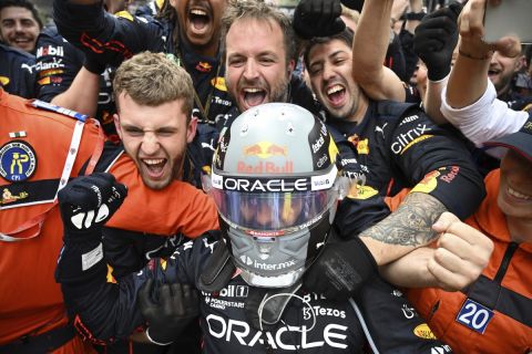 Red Bull driver Sergio Perez of Mexico celebrates after winning the Monaco Formula One Grand Prix, at the Monaco racetrack, in Monaco, Sunday, May 29, 2022. (Pool Photo/Christian Bruna/Via AP)