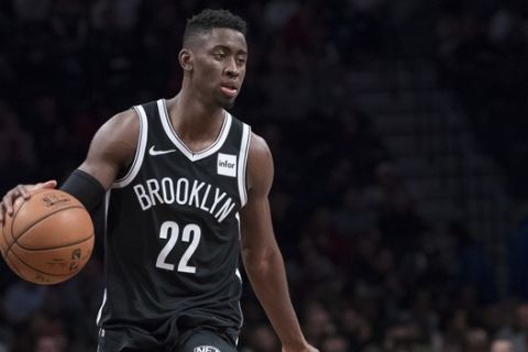 Brooklyn Nets guard Caris LeVert handles the ball during the second half of an NBA basketball game against the Houston Rockets, Friday, Nov. 2, 2018, in New York. The Rockets won 119-111. (AP Photo/Mary Altaffer)